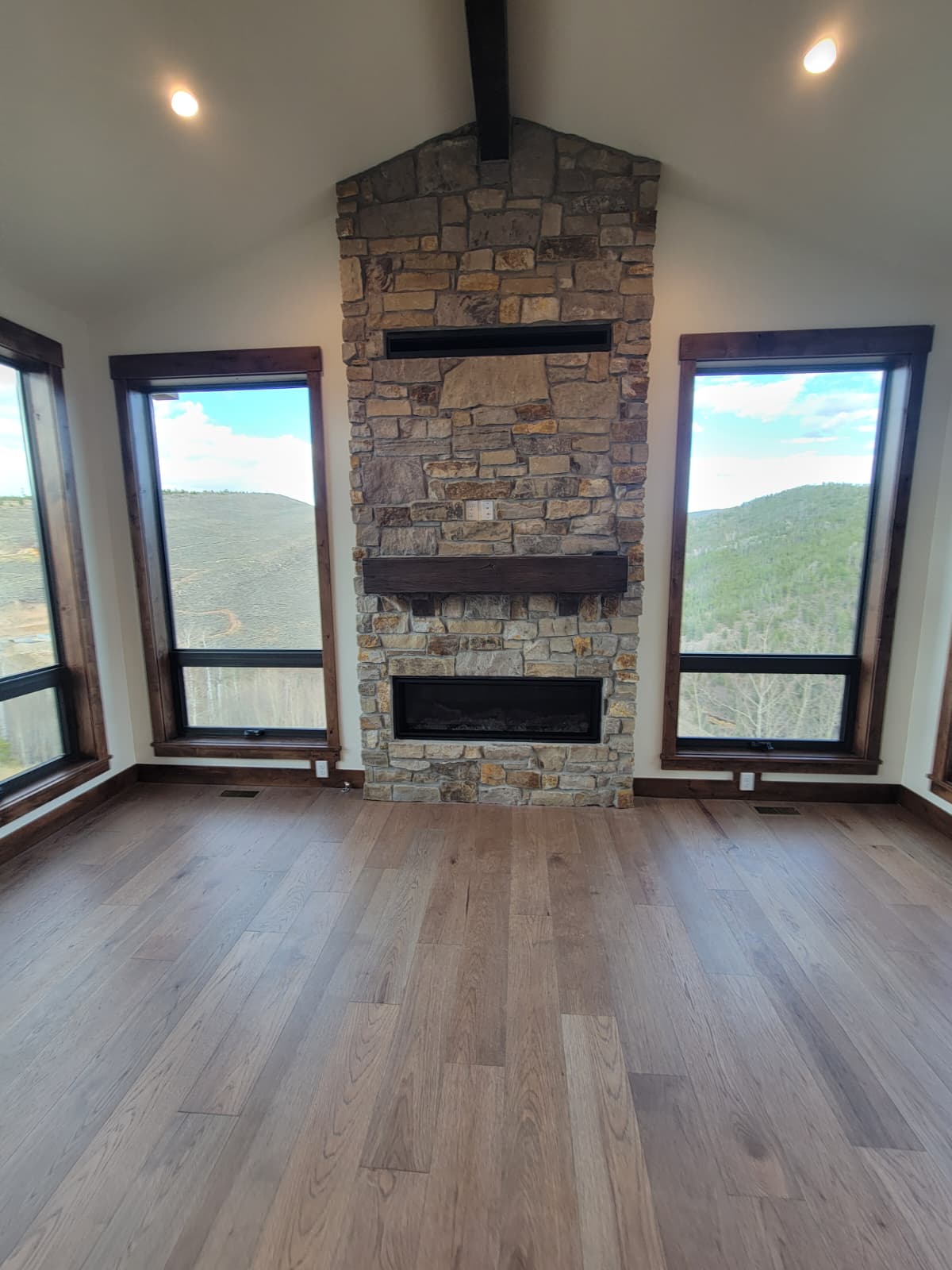 Wall with a tv outlet in stone faced wall